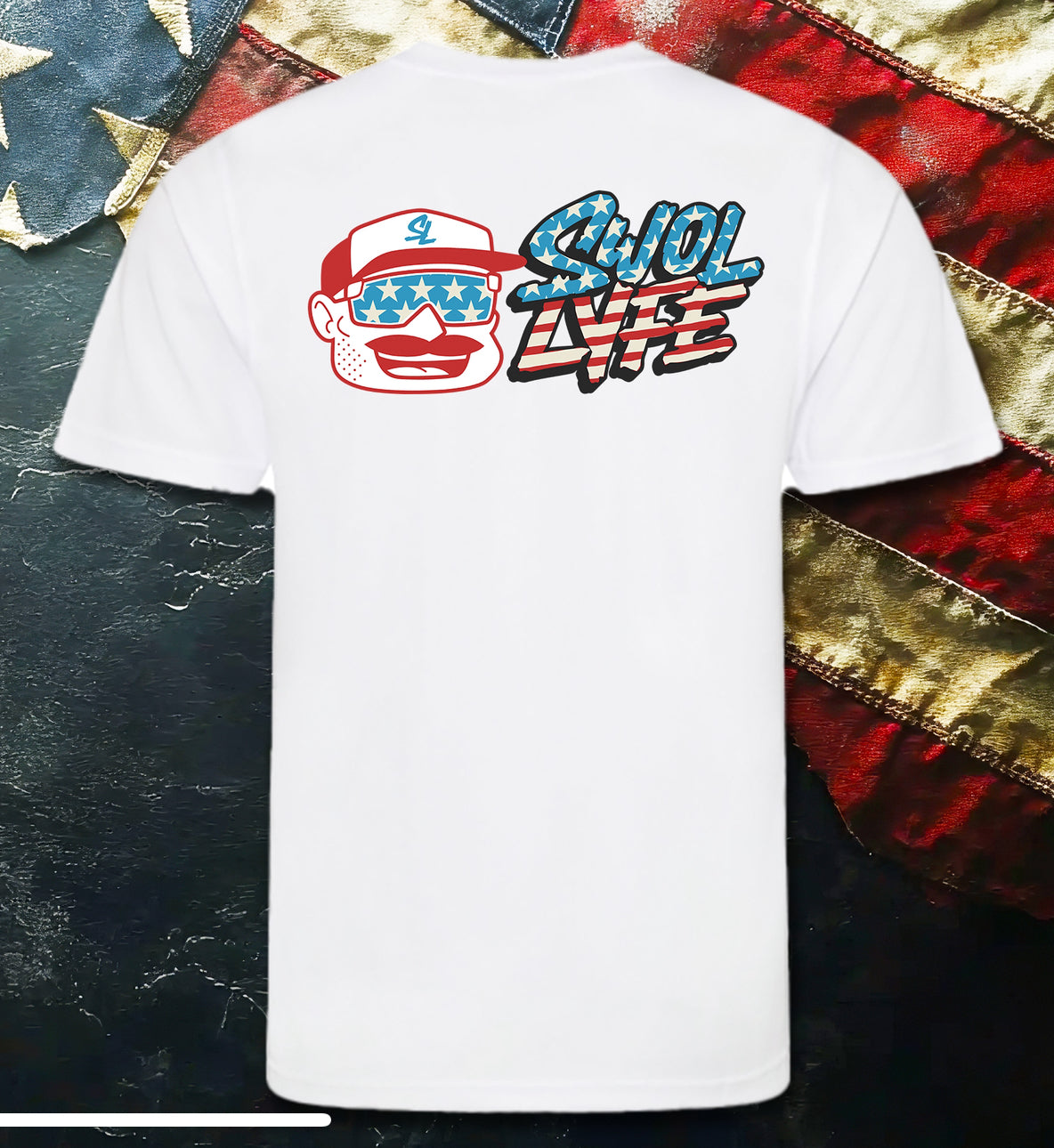 White t-shirt with a graphic design on the back against an American flag background